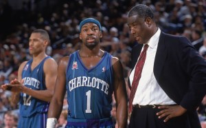 Point guard Baron Davis talks to head coach Paul Silas